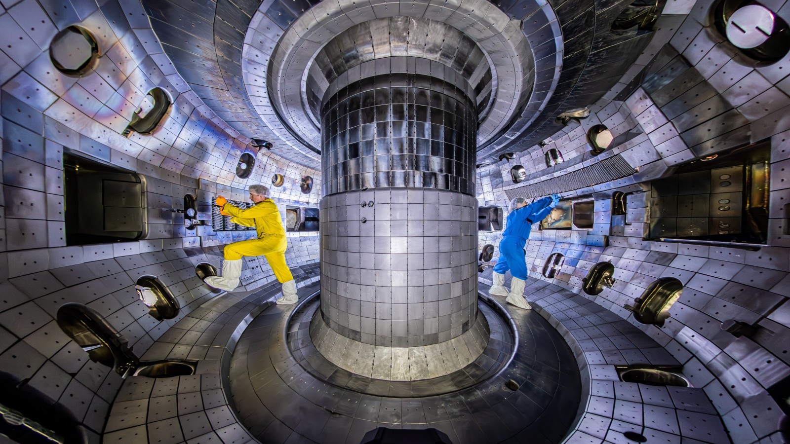 Workers inside of the DIII-D tokamak