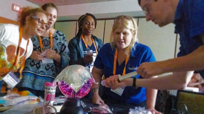 Teacher demonstration at desk