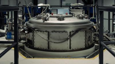 The top of Machine 3’s target chamber. The device fires a projectile at a fuel pellet at speeds approaching 50,000 miles per hour.Credit...