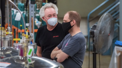 Dennis White, at left, the cofounder of Commonwealth Fusion Systems, and Bob Mumgaard, the company's CEO, at MIT's Plasma Science and Fusion Center.