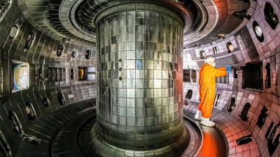 A worker inside the vessel at the DIII-D National Fusion Facility