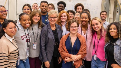 U.S. Secretary of Energy Jennifer Granholm with students enrolled in the Workshop in Plasma Physics for Undergraduates along with graduate students in the Science Education Laboratory.